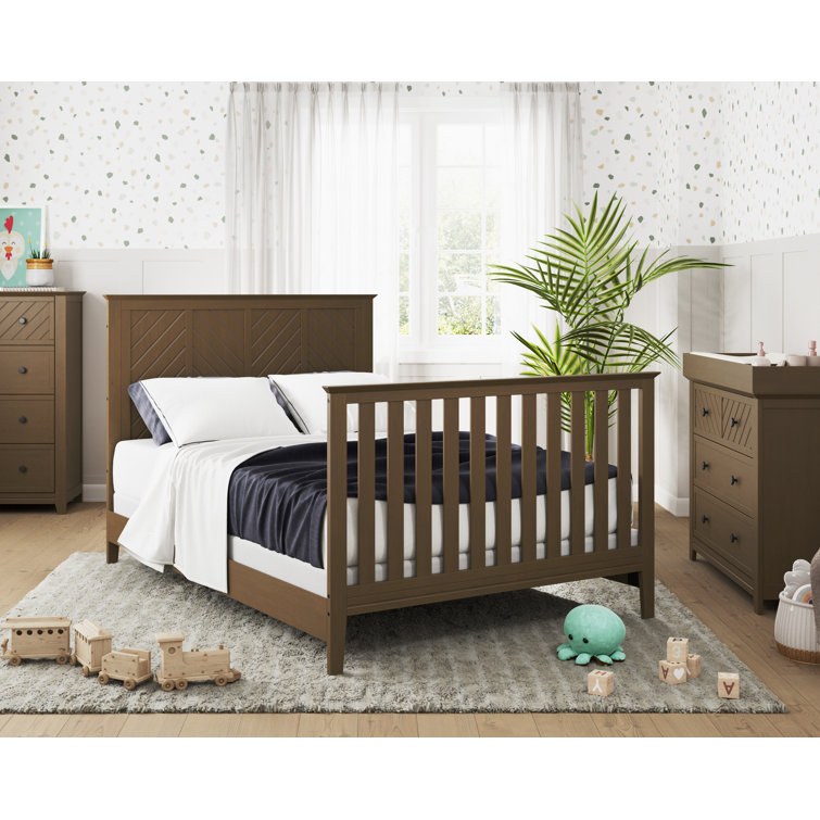 Bed rails for outlet crib conversion